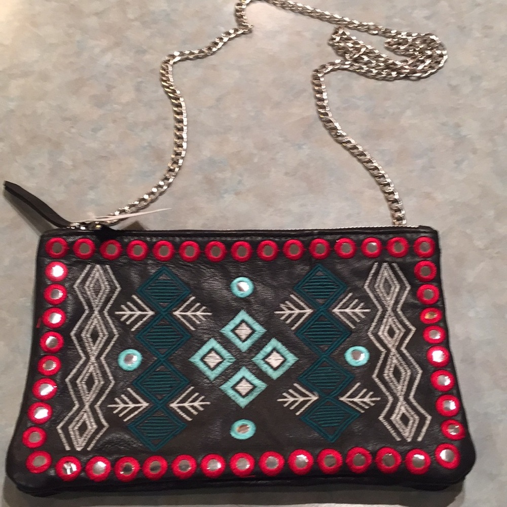 Topshop leather purse with embroidered pattern.